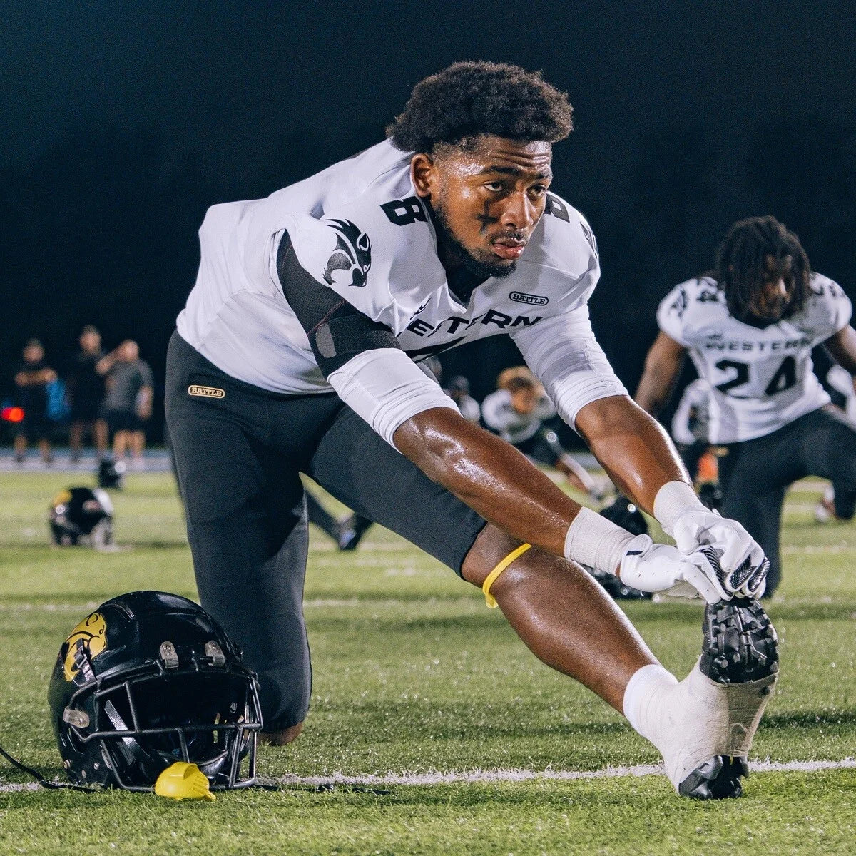 Why Do Football Players Tape Their Cleats?