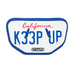 Novelty license plate with 'California K33P UP' text on a white background