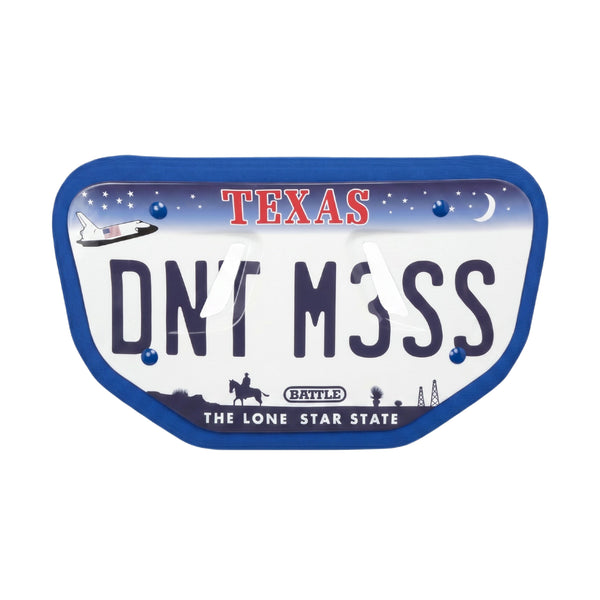 Texas license plate with 'DON'T MISS' text on a white background