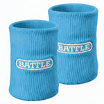 Two blue wristbands with 'BATTLE' branding on a white background