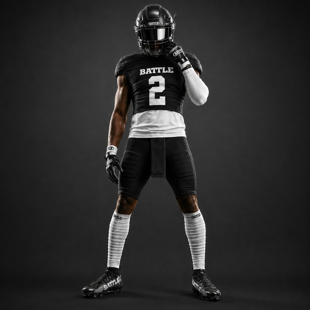 Person wearing a black football uniform with 'BATTLE' and number '2' on a dark background