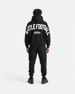 Black hoodie with 'BATTLE FOOTBALL' text on a white background